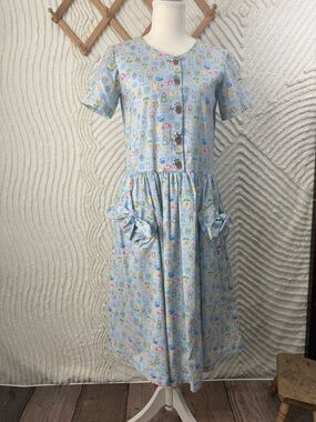 VINTAGE Blue Midi Dress with Playful Garden Print and Front knotted bow Pockets